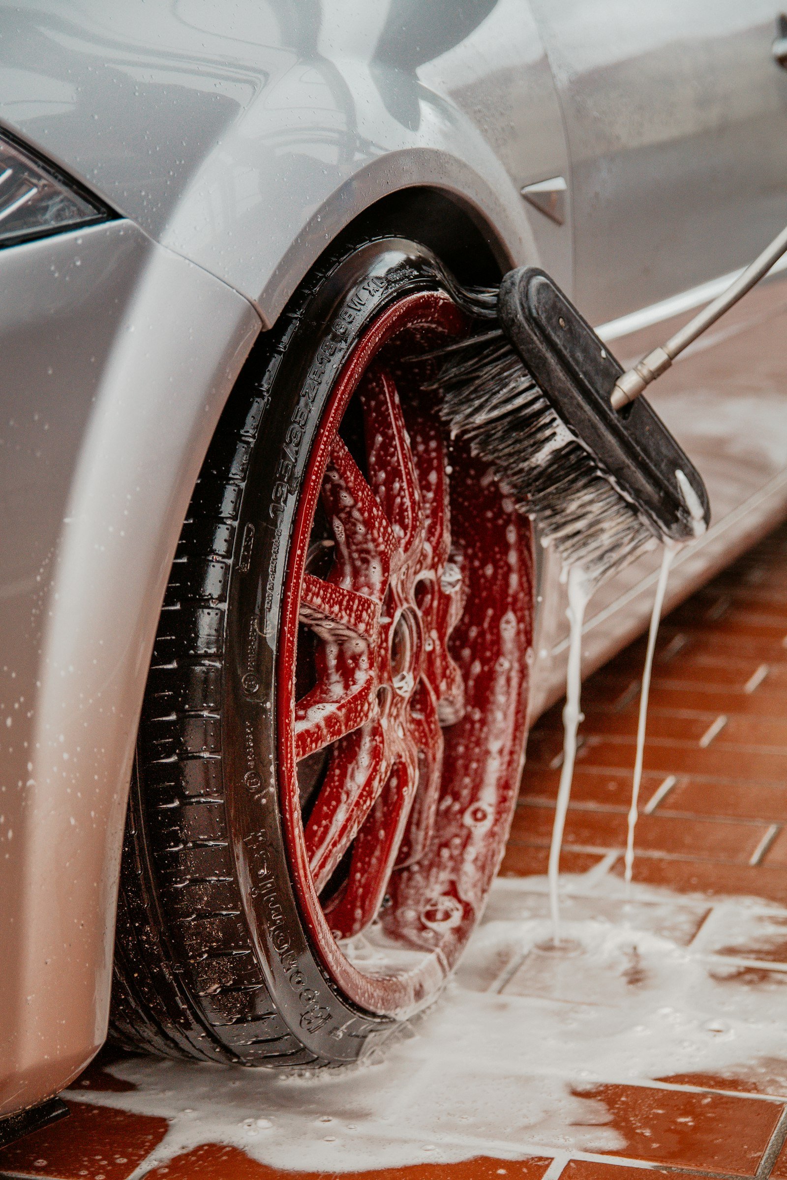 http://Alloy%20wheel%20being%20cleaned%20during%20a%20wash
