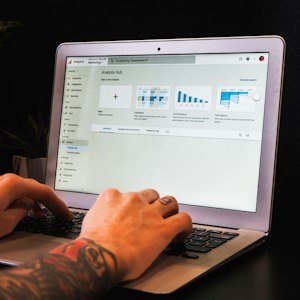Marketing analyst reviewing campaign screens