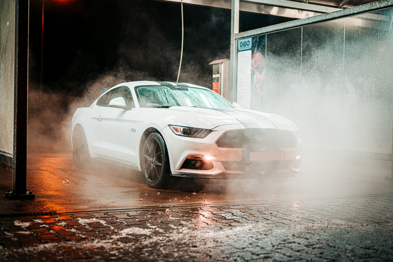 White car going through a car wash