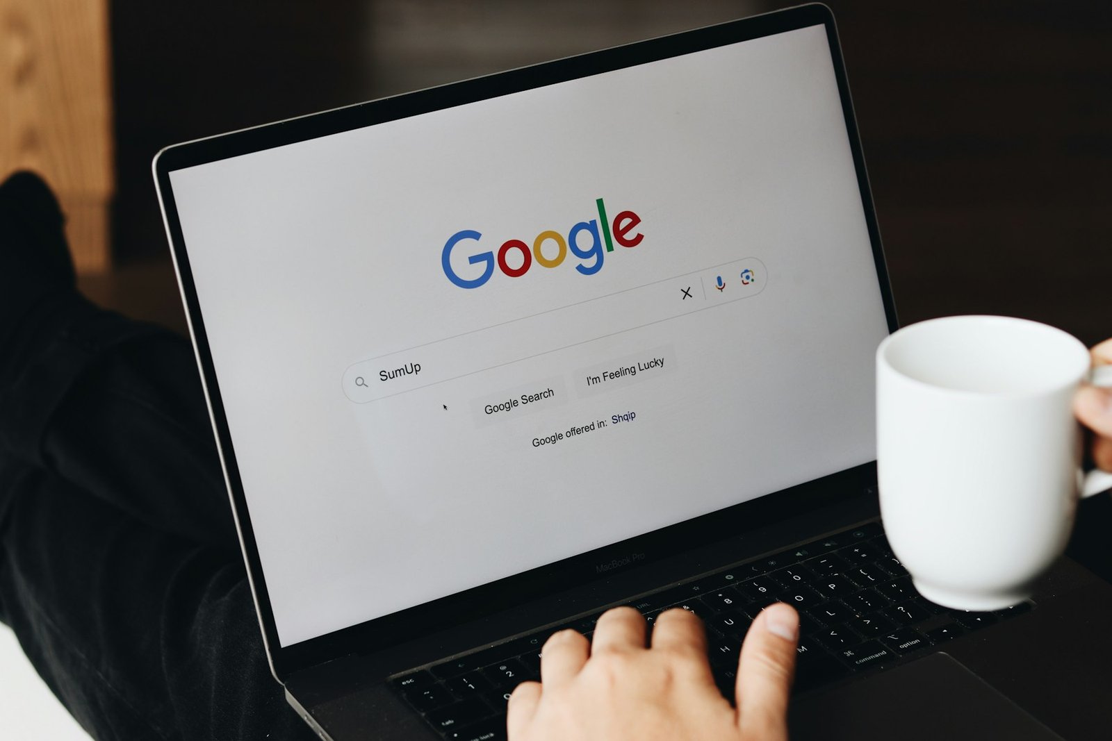 Laptop showing a Google search page