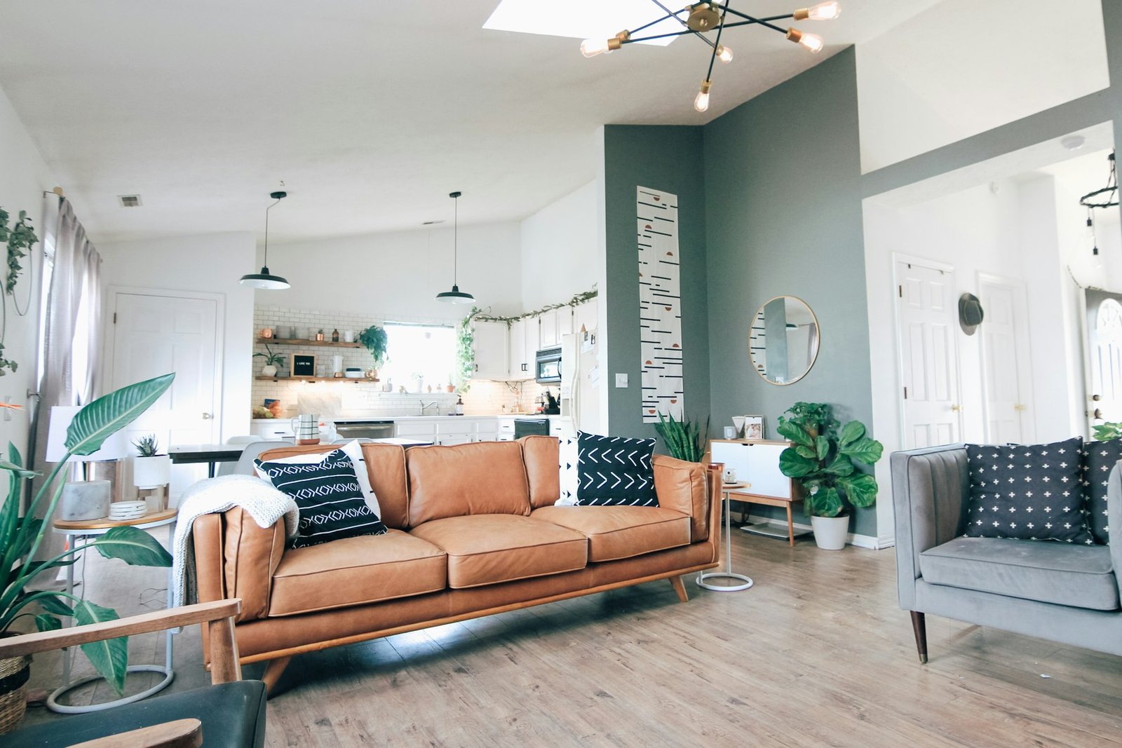 Bright living room with a leather sofa