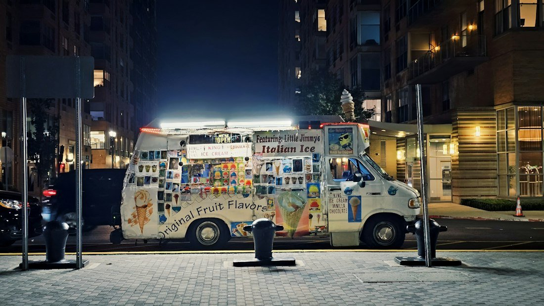 A food truck parked on the side of the road
