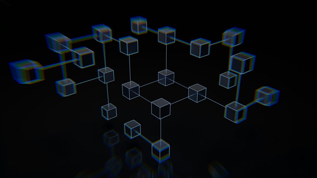 A group of cubes that are on a black surface