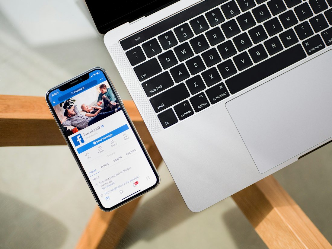 IPhone X beside MacBook