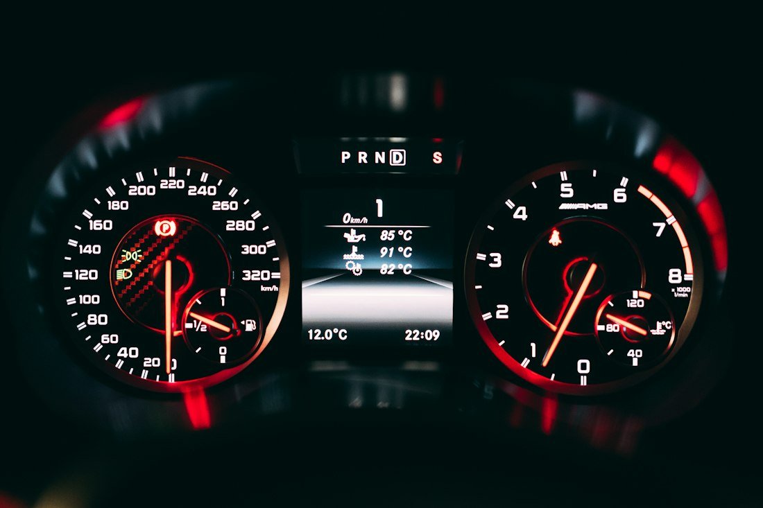 Black and red analog speedometer