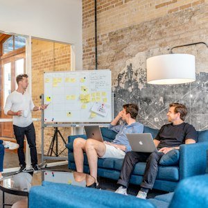 Team planning a campaign at a whiteboard